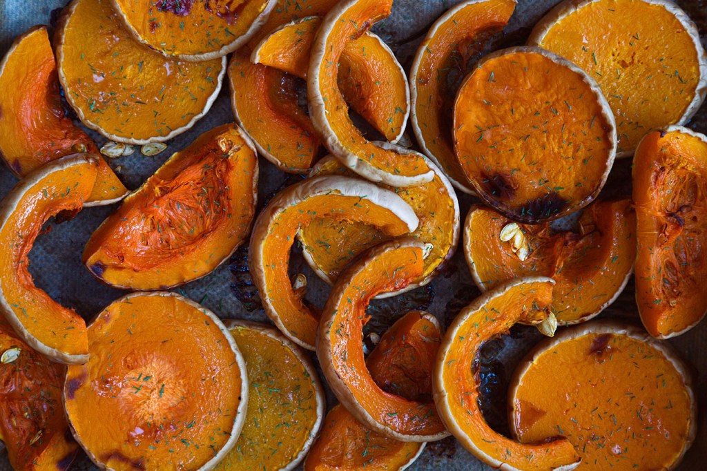Roasted butternut squash slices, close up.