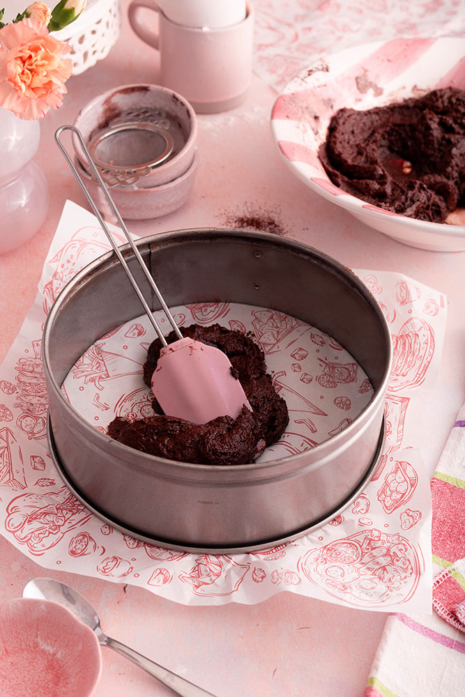 Chocolate sponge cake with Greek yoghurt for  chestnut and chocolate mousse cake in the baking tin.