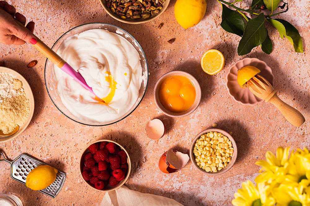 Whisked egg whites for indulgent Mascarpone and White Chocolate Pistachio Lemon Torte-cake