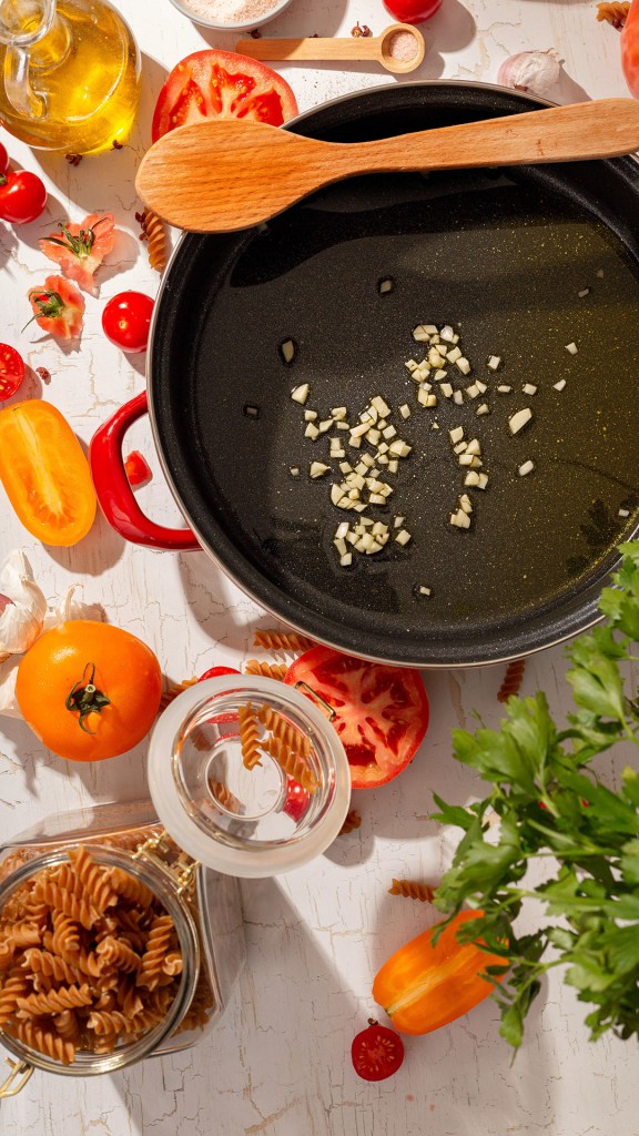 Healthy Fresh Tomato and Feta Cheese Pasta Sauce for Wholemeal Pasta, garlic in olive oil.