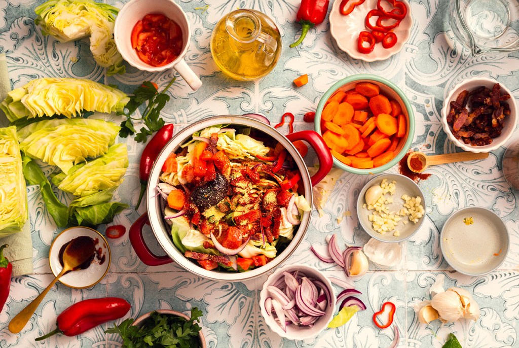 Sweetheart Cabbage Stew with Summer Vegetables and crispy, fried pancetta- process shot.