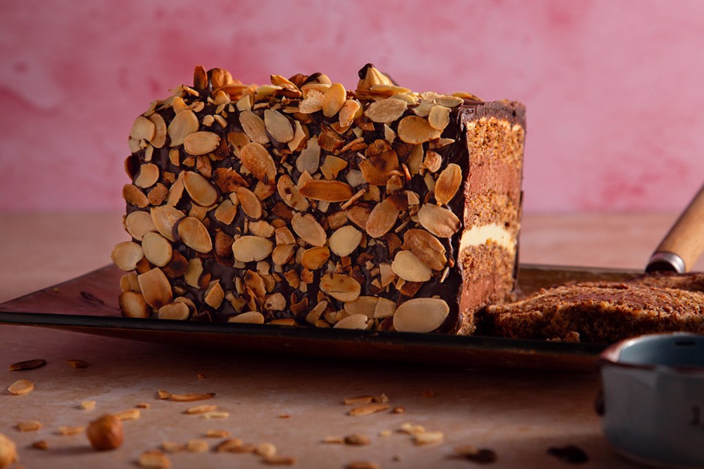 Torte of walnut dacquoise layered with vanilla and chocolate crème mousseline.