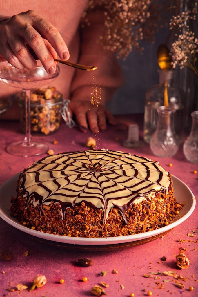 Esterhazy torte with almonds with the sprinkle of gold dust.